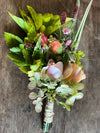 A Common Farm Flowers buttonhole is a miniature work of art, made with five little stems of gorgeous detail, bound with raffia, pinned in advance, delivered in their own individual test tube to keep it fresh as a daisy until the very last minute. Grown, cut, arranged by Somerset flower farmer & florist Georgie Newbery.