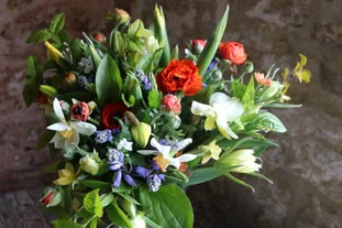We are still open and delivering flowers....