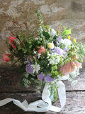 Common Farm Flowers Bridesmaid's Bouquets are a smaller version of our Bride's Bouquet, but with the same eye for detail and unusual highlights grown and cut for you here on our flower farm. The flowers in the bouquet are picked fresh from the farm and arranged by Georgie Newbery. Somerset wedding flowers and florist. 