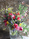 Join Georgie for this fun demo, where she demonstrates making a Spring hand tied bouquet with flowers cut fresh from her flower farm in Somerset. Georgie will show you the exact method of making a hand tied twist, with lots of different varieties of flowers and foliage, so you’ll get lots of inspiration for you to forage some lovely ingredients to go in a spring flower posy. 